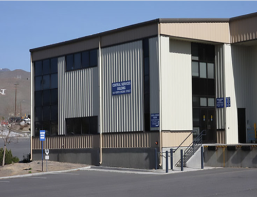 An image of the front entrance of the Central Services Building